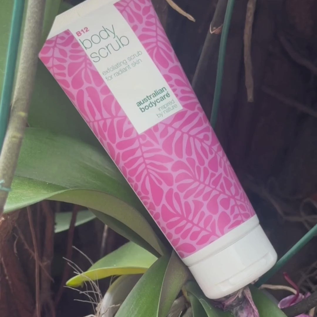 Video of a model applying our Vitamin B12 body scrub to her skin in circular motions, showing the exfoliating texture and how it helps smooth and refresh the skin.