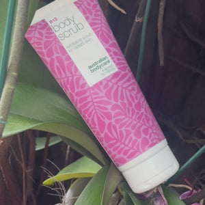 Video of a model applying our Vitamin B12 body scrub to her skin in circular motions, showing the exfoliating texture and how it helps smooth and refresh the skin.