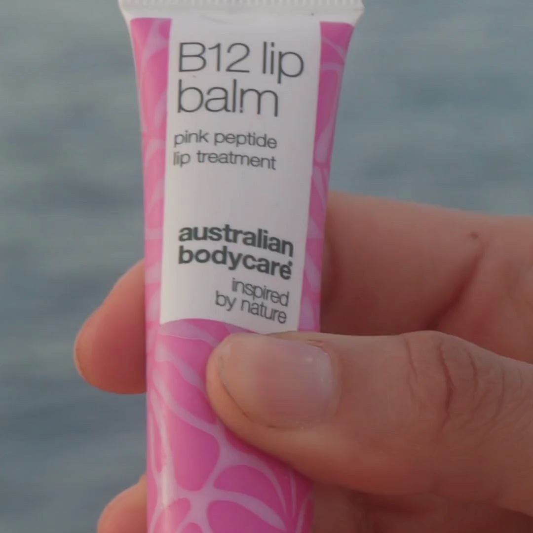 Video of a model applying our Vitamin B12 lip balm to her lips, showing its smooth texture and how it leaves the lips soft and hydrated.