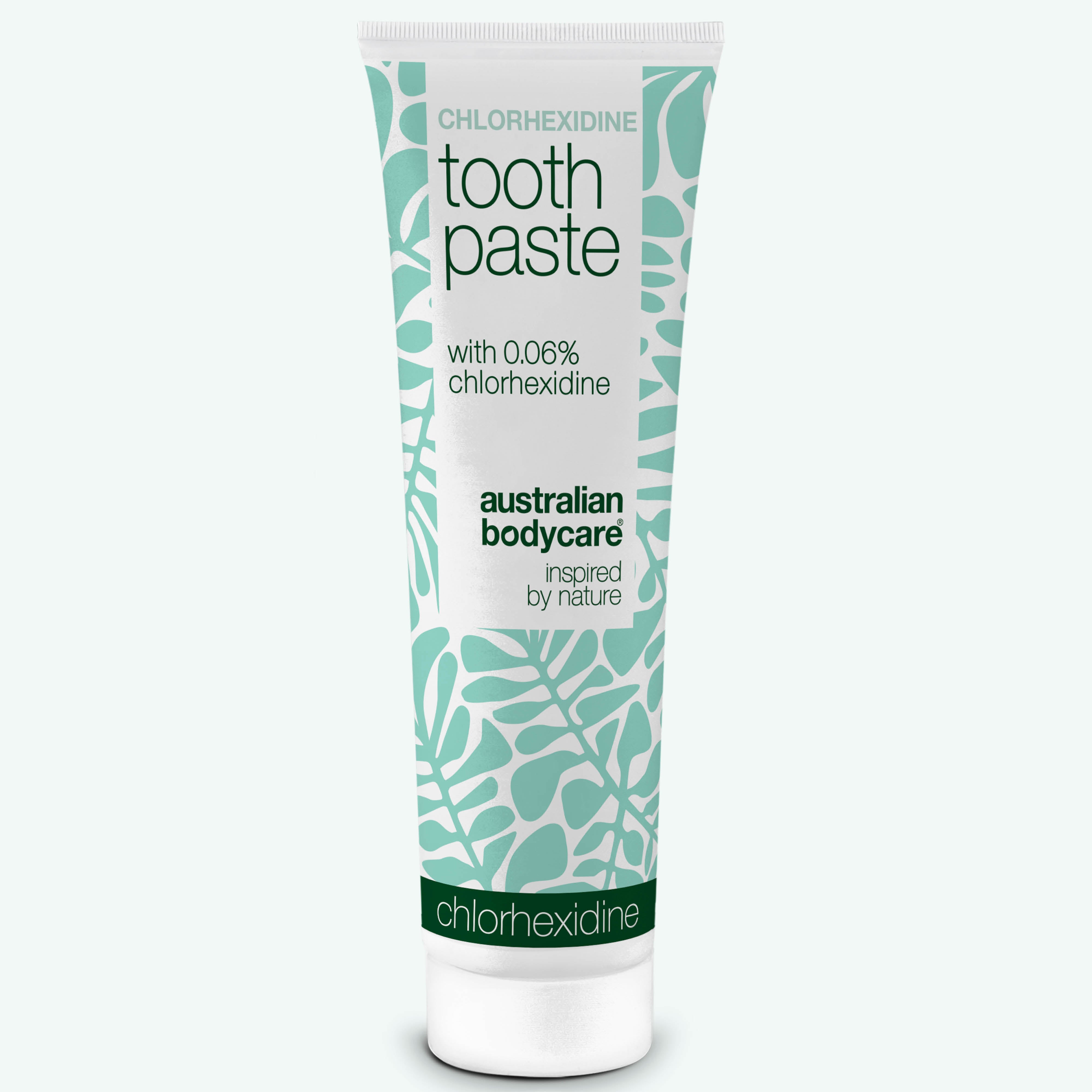 White and mint green tube of Australian Bodycare Chlorhexidine toothpaste with 0.06% chlorhexidine on a white background.