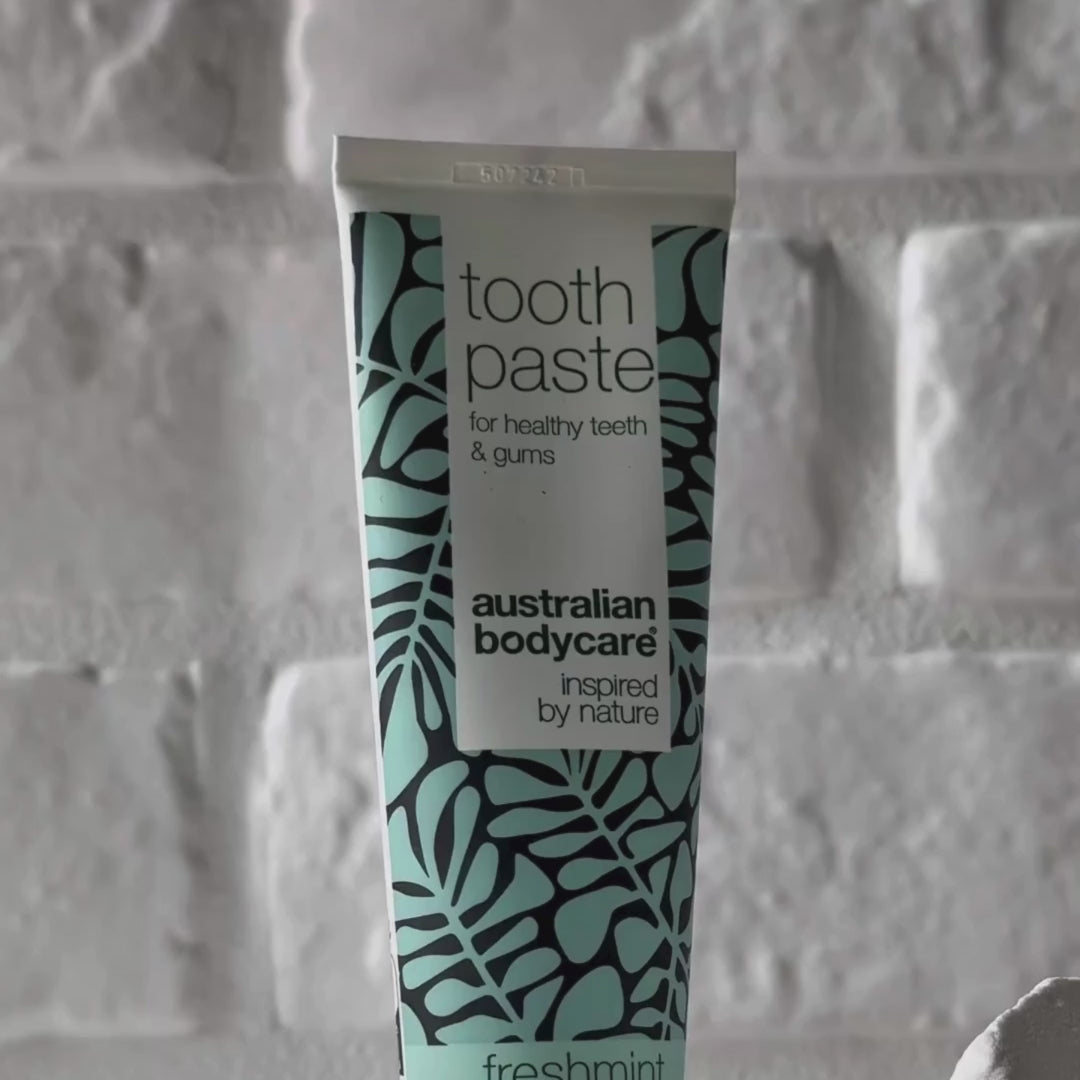 Video showing Australian Bodycare Toothpaste with Tea Tree Oil and its light blue paste texture.