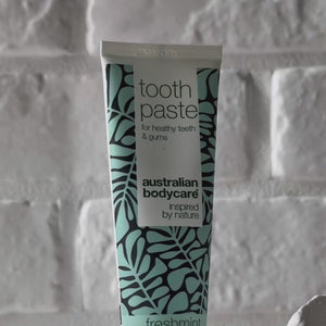 Video showing Australian Bodycare Toothpaste with Tea Tree Oil and its light blue paste texture.