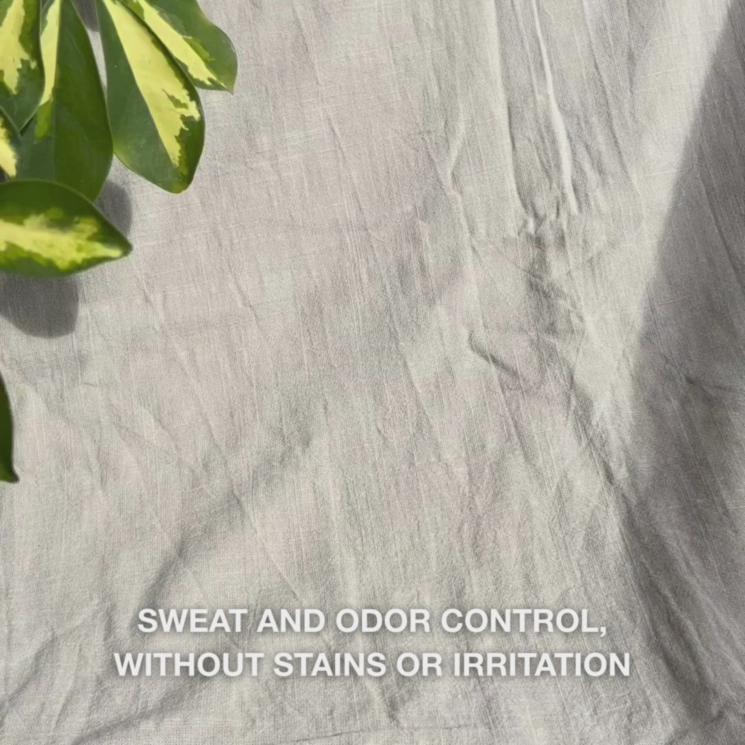 Close-up of a hand rolling the clear, gel-like, fast-drying deodorant onto clean underarm skin: the smooth, transparent texture glides gently, providing an antiperspirant barrier while soothing, moisturizing, and leaving skin feeling fresh and residue-free.